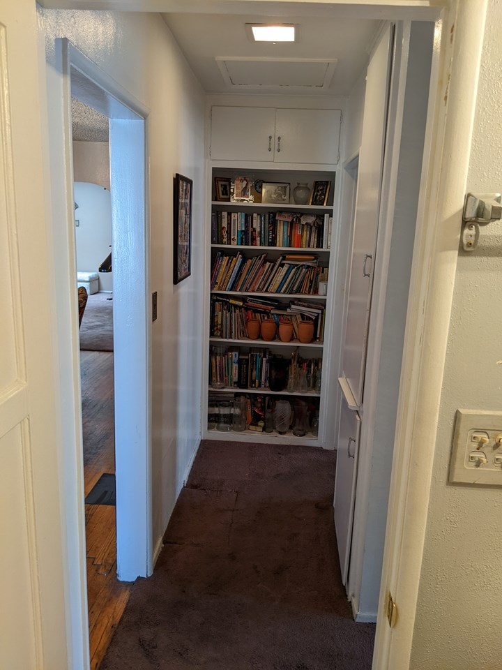 hallway with linen closet