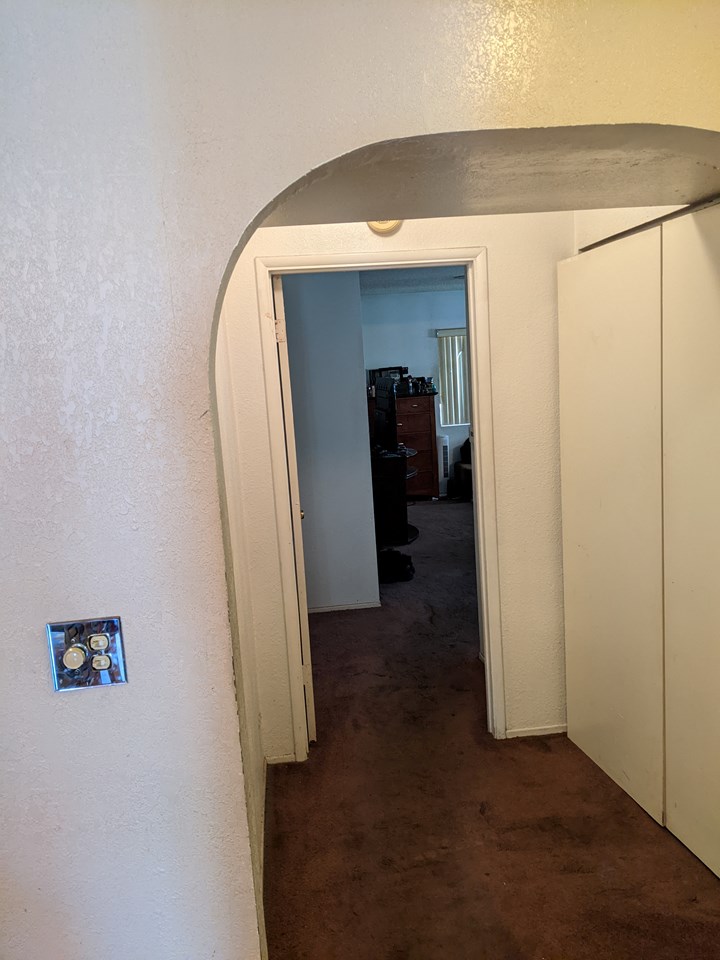 hallway with laundry area